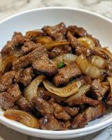 Bistec encebollado