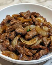 Bistec encebollado